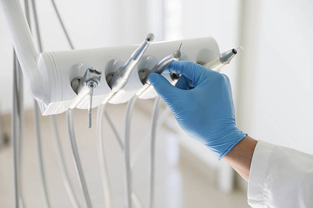 Professional Tooth Extraction technician working in El Dorado, AR